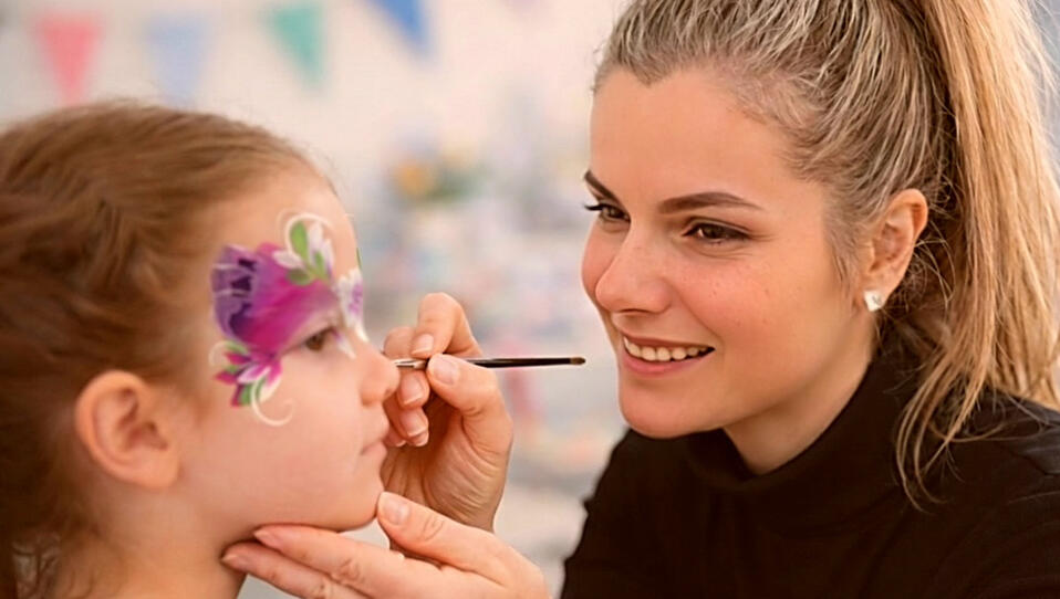 Girl's Face Painting in progress Girl's Face Painting in progress